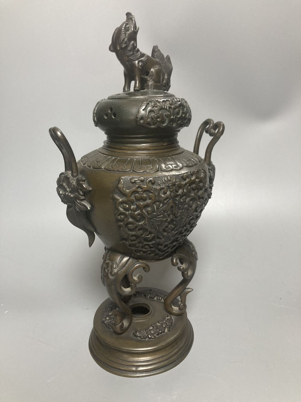 A Japanese ivory box and cover and a bronze koro and cover